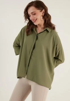 LELA Oversized - Overhemdblouse - Khaki -LELA Winkel 0c2fc645d57c49c6b44cd00d8e3ab537