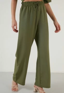 LELA Loose Fit- Broek - Khaki 12 LELA Loose Fit- Broek - Khaki -LELA Winkel 7d264ec7a7164b98852f38987b7b9184