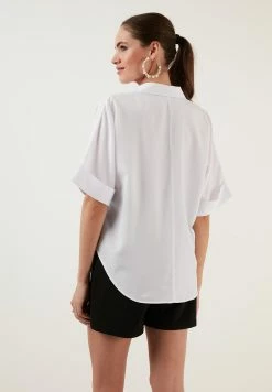 LELA Loose Fit - Blouse - White -LELA Winkel bf46fe0e9e1e4355882c0ff5918ca57d