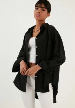 LELA Loose Fit - Overhemdblouse - Black -LELA Winkel e988a4c75b5546dab4e40c9182bd7033