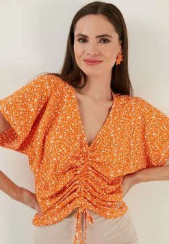 LELA V-Neck - Blouse - Orange -LELA Winkel ef9ae5c907f443f7a813020236ad7e0e